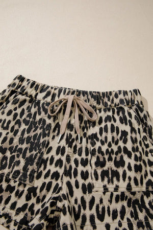 Denim shorts with leopard print and a lace-up drawstring waist.