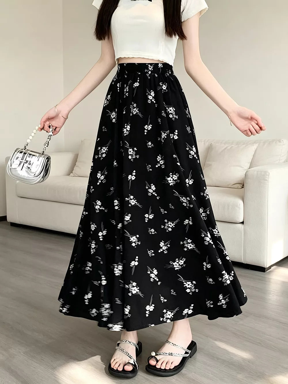 black A-line skirt with elastic and ditsy floral