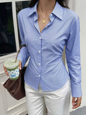 light blue button-down shirt with striped and collared