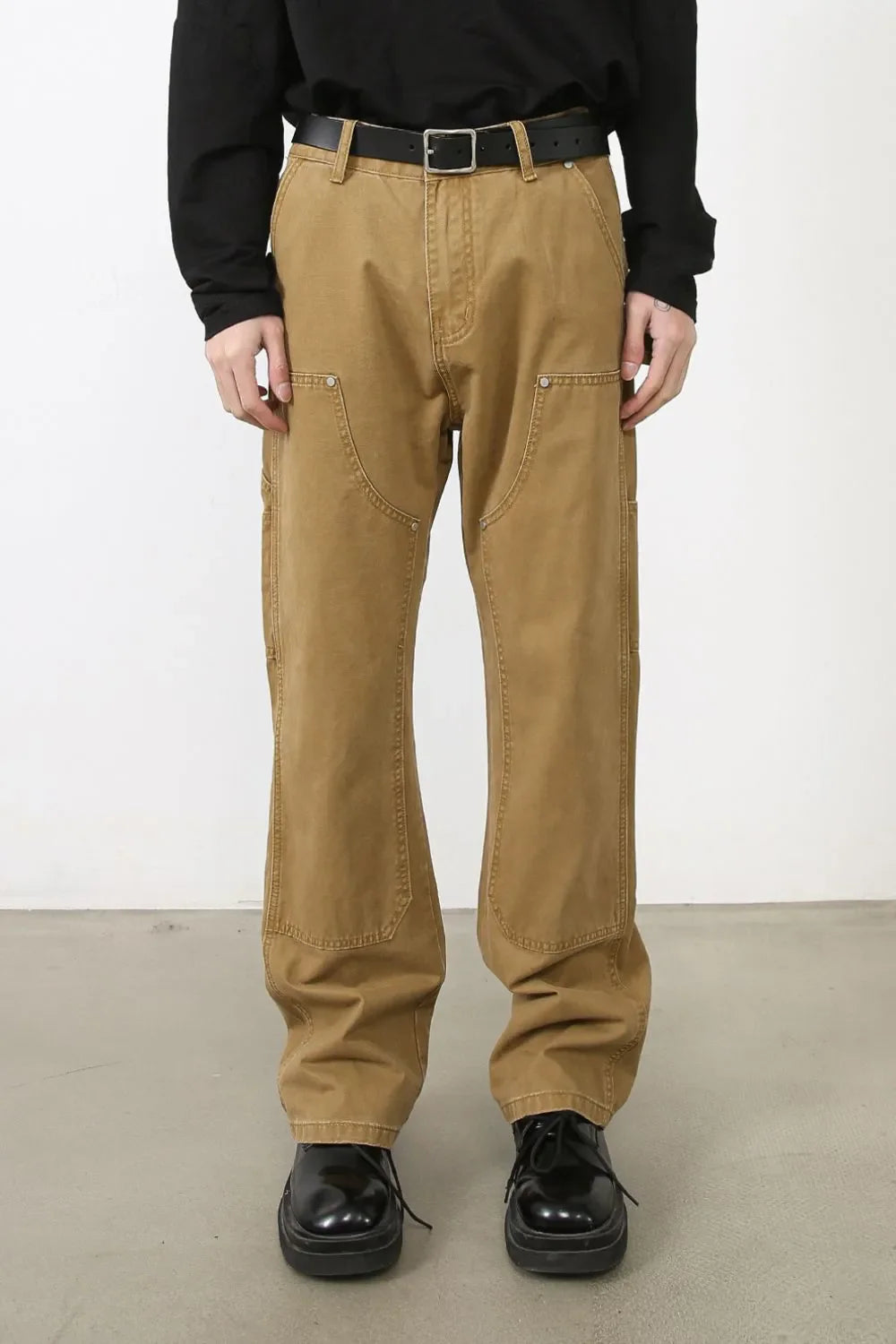 Carpenter-inspired wide leg trousers in camel with double knee detailing and utility pockets.