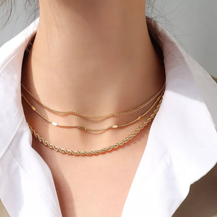 Gold necklace featuring 18K gold-plated and rope chain