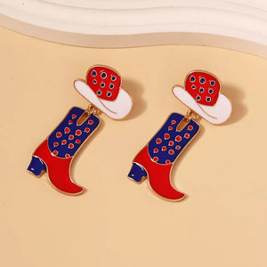 Red, white, and blue cowboy boot dangle earrings with polka dot hats.