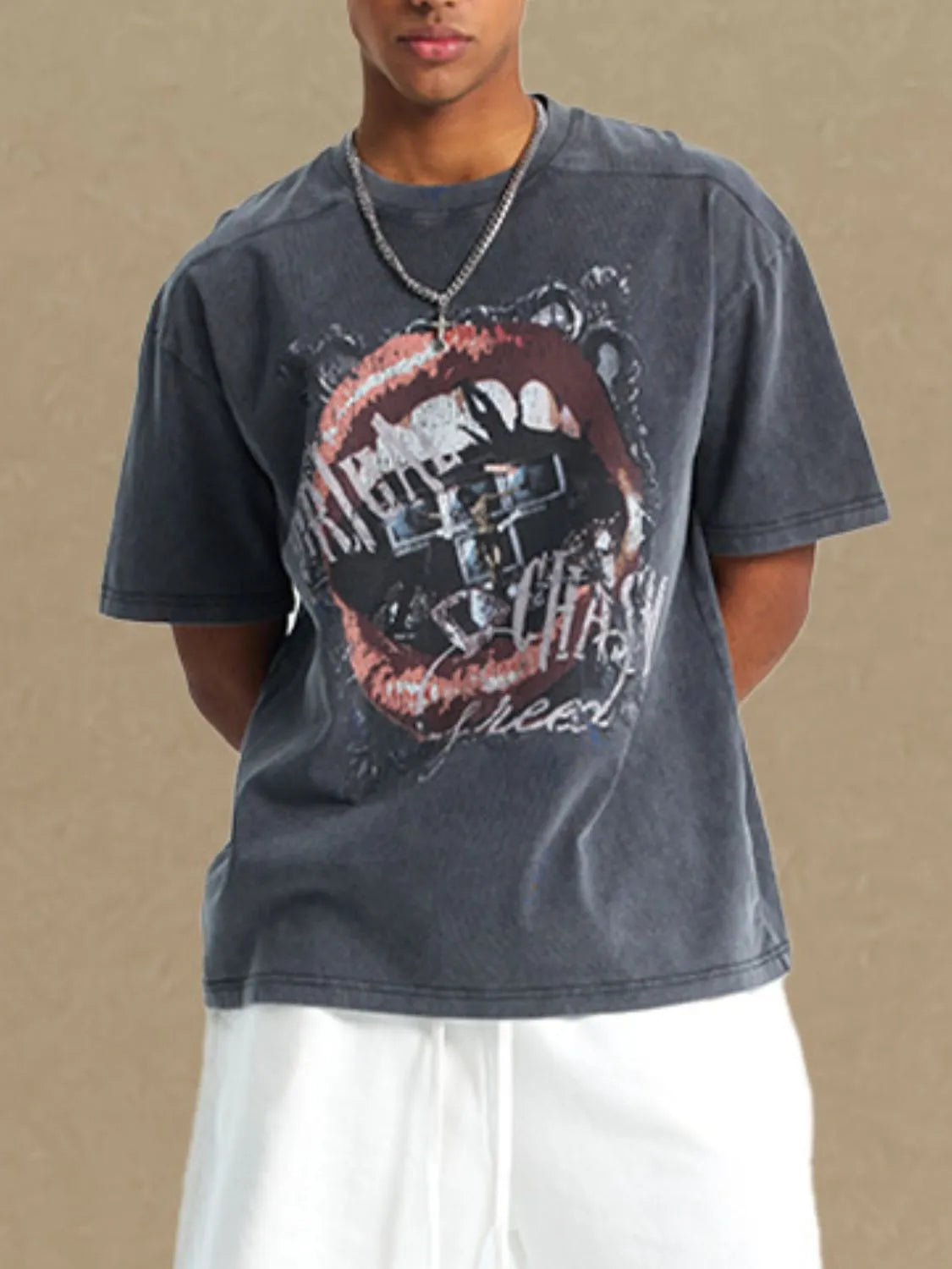 Graphic print washed cotton tee in dark gray with a distressed graphic of lips and text.