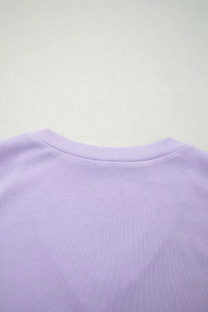 Lilac ribbed bodice detail of a floral maxi dress