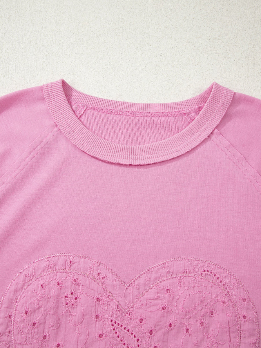 Pink cotton crew-neck sweatshirt with embroidered heart detail