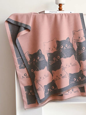 Charming reversible scarf in pink gray with a cute cat pattern.