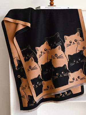 Reversible black and tan scarf with a cute all-over cat pattern.
