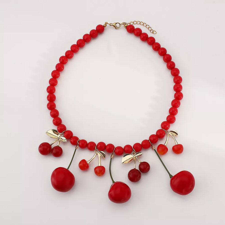 necklace featuring cherry motif in Cherry with 18K Gold-Plated, Alloy, Resin Care instructions: Avoid wearing during