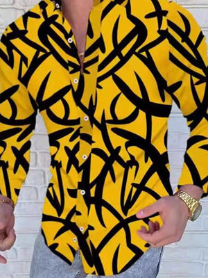 Yellow slim-fit shirt with abstract black scribble print and button-up front.