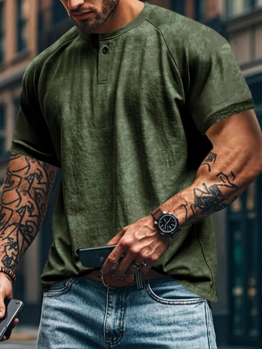 Army green textured henley tee with raglan sleeves and a button placket.