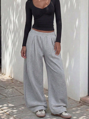 50% viscose, 50% polyester Care instructions: Machine wash cold sweatpants in Gray with wide-leg silhouette
