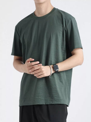 Men's olive green relaxed fit cotton t-shirt with crew neck and short sleeves.