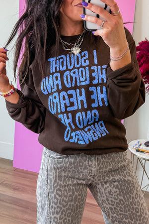 blue sweatshirt featuring slogan print and polka dot