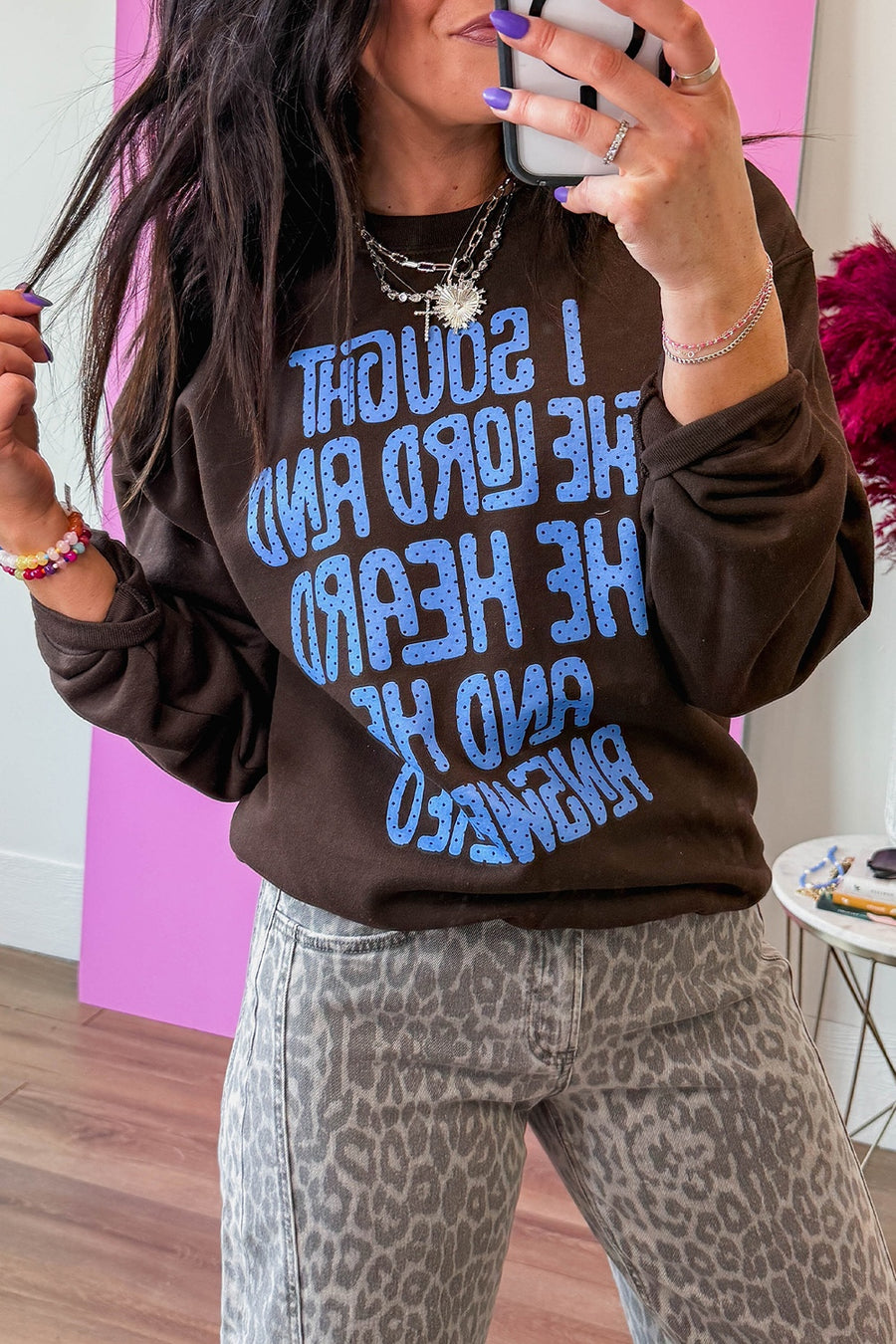 blue sweatshirt featuring slogan print and polka dot