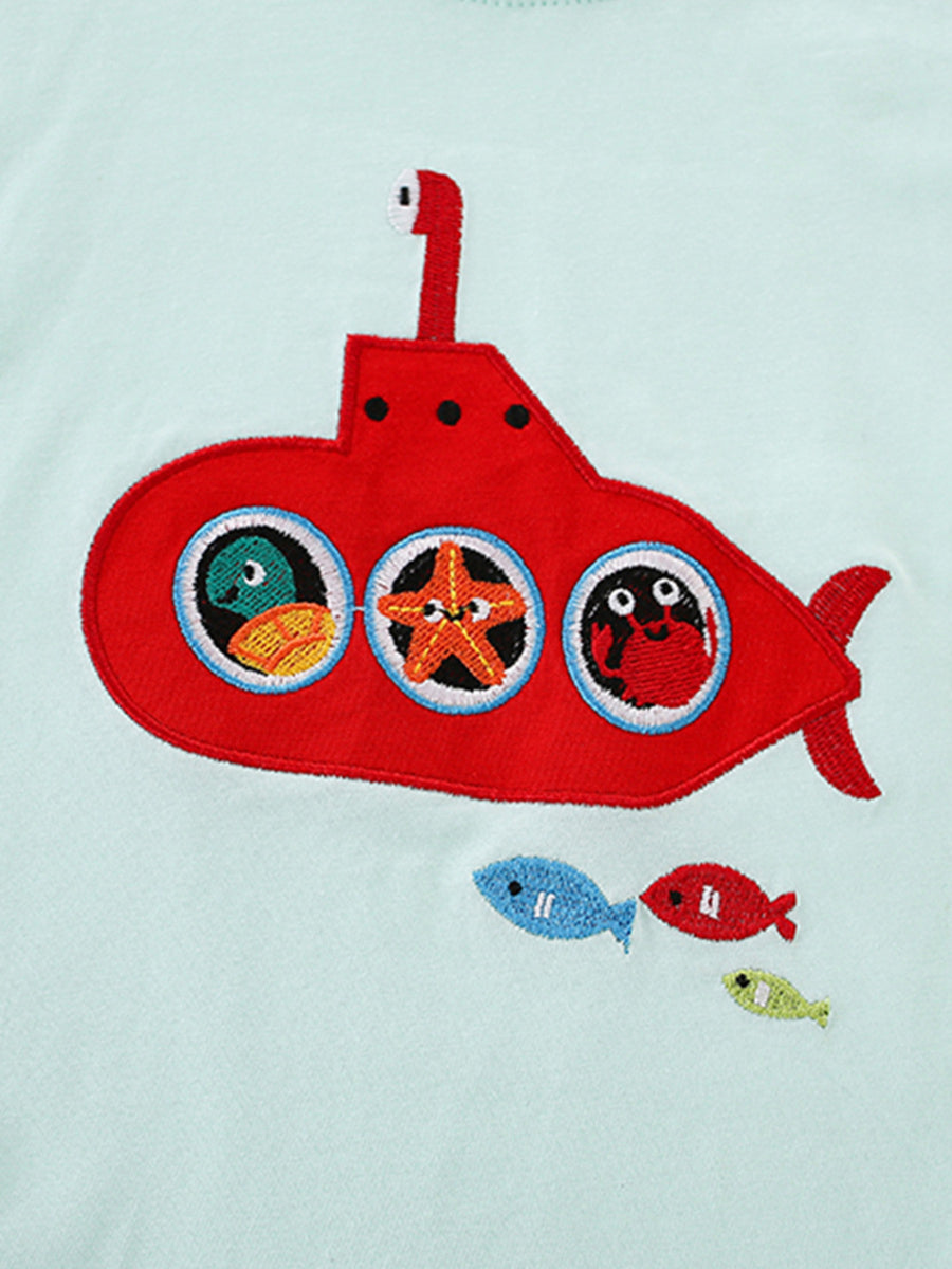 Light blue cotton crew neck t-shirt with embroidered red submarine, duck, starfish, crab, and fish.