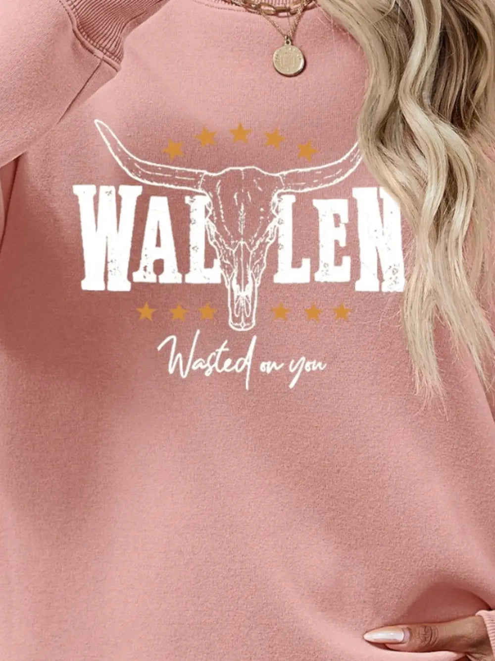 Blush pink graphic sweatshirt with bull skull and text Wasted on you.