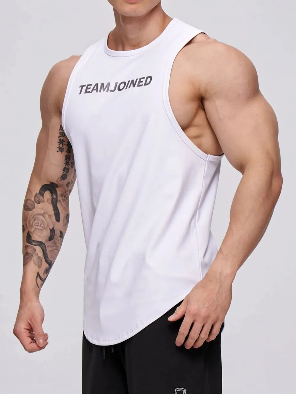 White performance tank top with TEAMJOINED graphic, crew neck, and sleeveless design.