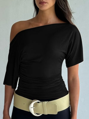 Black ruched one shoulder t-shirt with asymmetrical neckline and short sleeves.