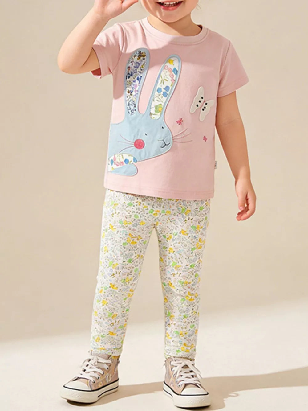 Pink cotton t-shirt with floral bunny applique and floral print leggings for baby girls.