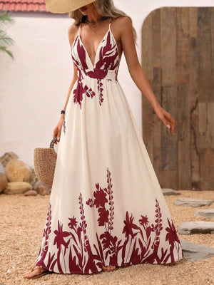 Maxi dress with deep V-neck, spaghetti straps, and a-line skirt in a floral print.