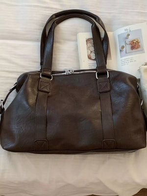 Large brown pu leather shoulder bag with double handles and silver hardware.