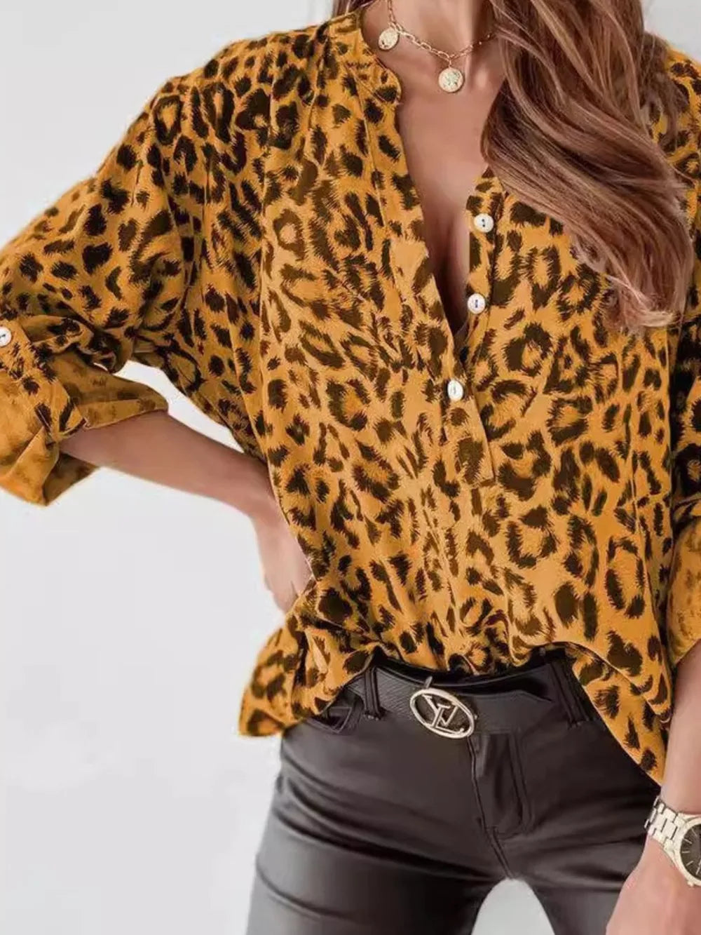 Gray blouse with hip-length and half-button