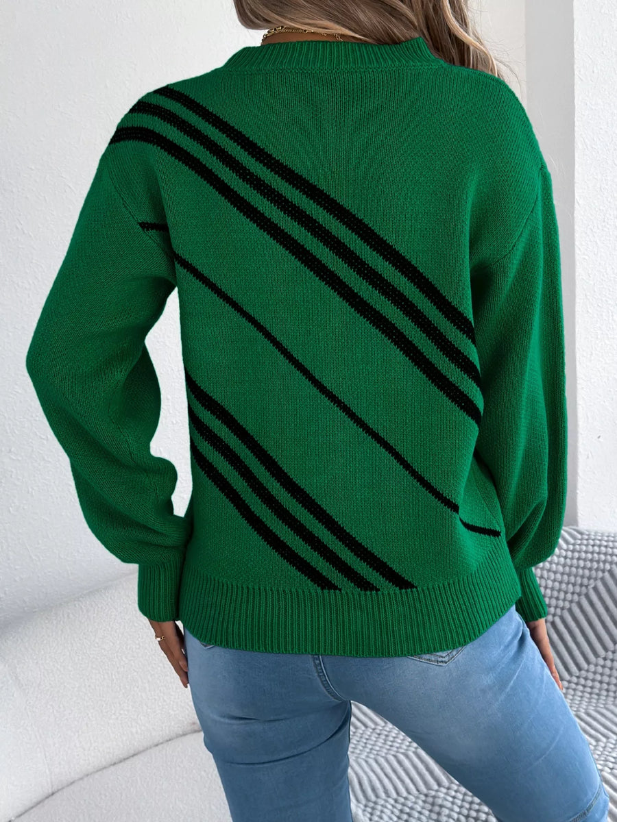Green acrylic blend sweater with black diagonal stripes and round neck.