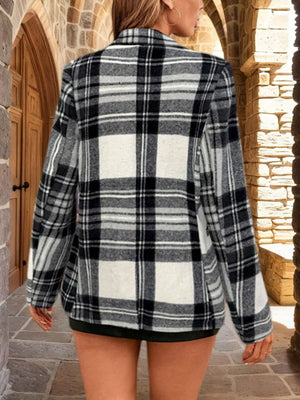 Black and white plaid single-button blazer with a classic collar and long sleeves.