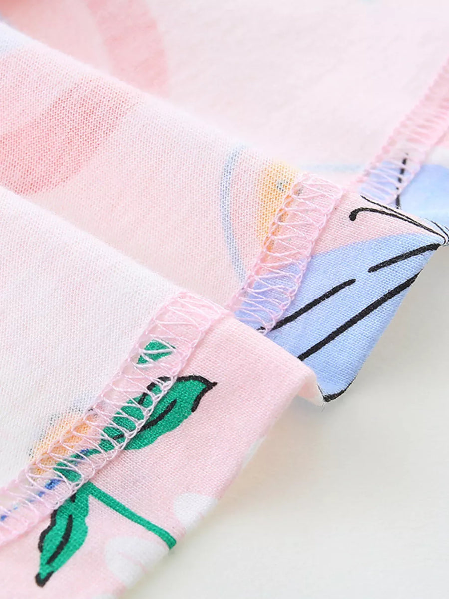 Toddler dress with pink blush, butterflies, rainbows, and green leaves on cotton fabric.
