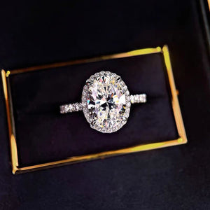 925 sterling silver,Moissanite Carat weight: 2ct Care instructions: Avoid wearin ring in clear with classic silhouette
