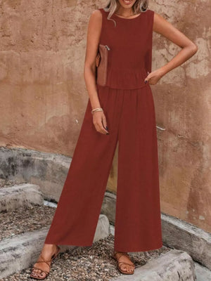 Burgundy ruffled peplum top and wide-leg pants set with a round neckline and sleeveless design.