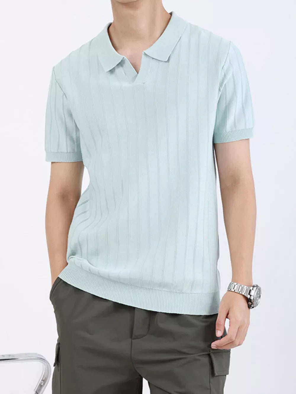 Light blue ribbed knit polo shirt for men with short sleeves and a V-neck collar.