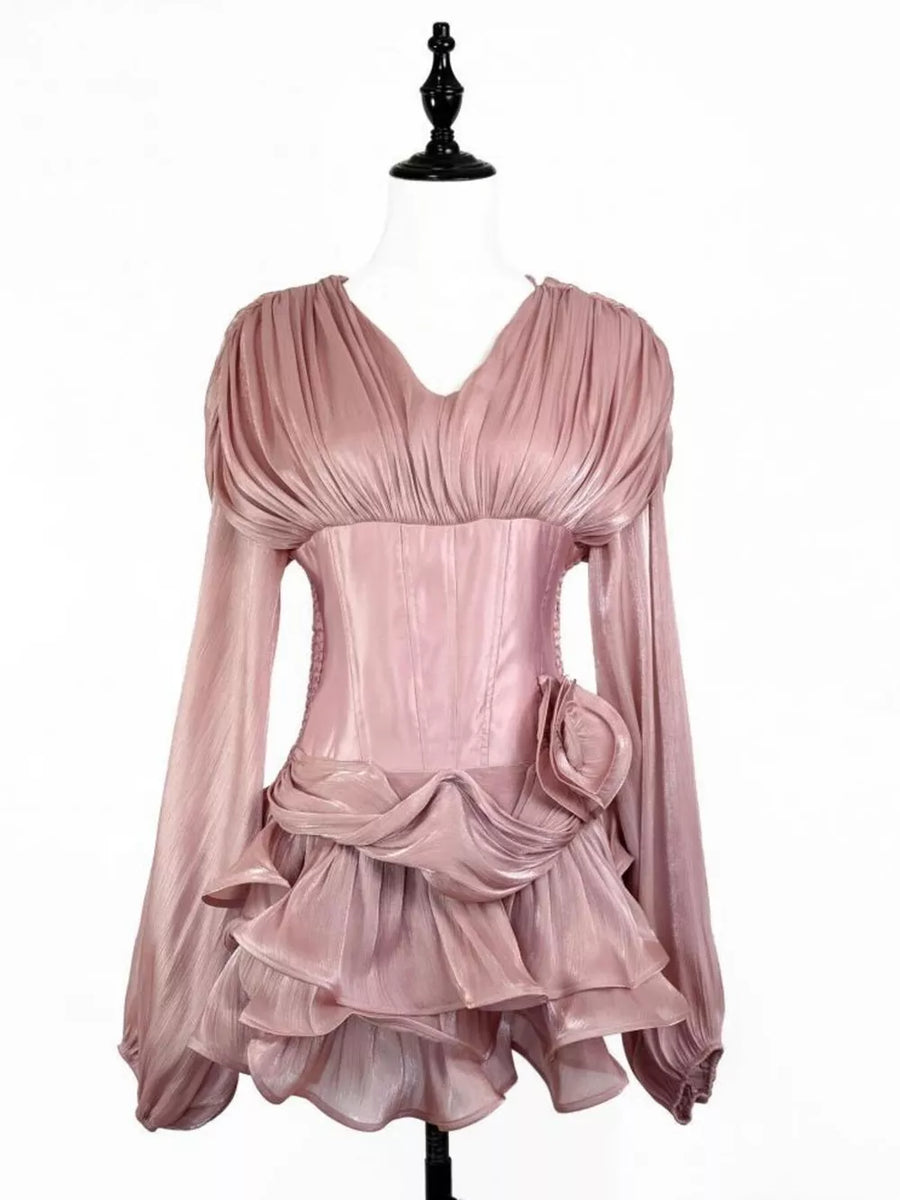 Pink ruffled mini dress with corset waist and ruched V-neck bodice.