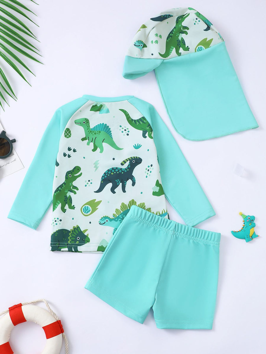Children's turquoise dinosaur print swimwear set with long sleeve rash guard and shorts.