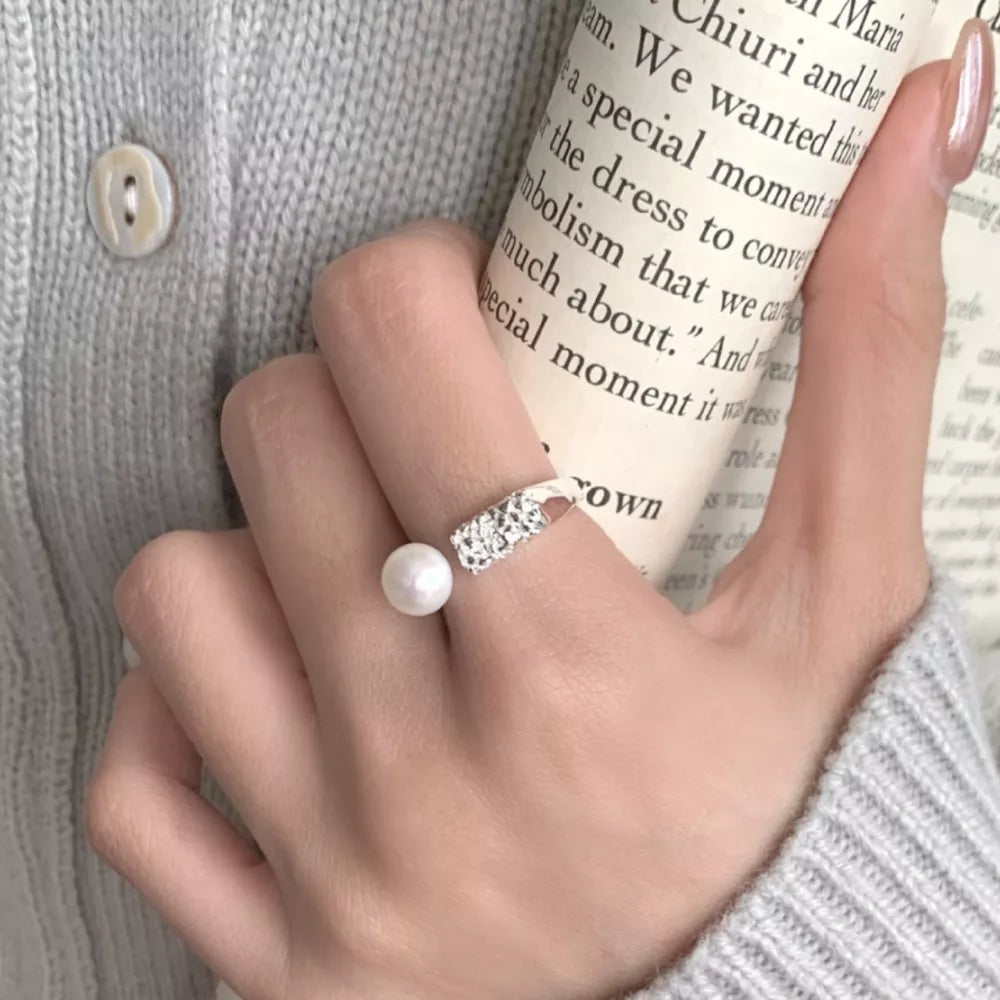 silver ring with textured and not applicable