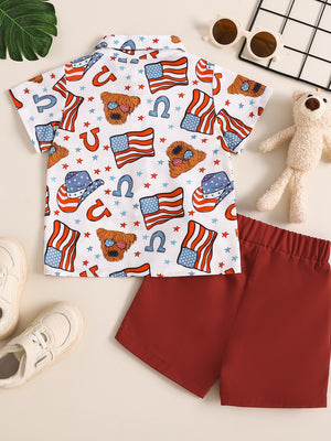 Toddler patriotic print short sleeve shirt with red shorts.