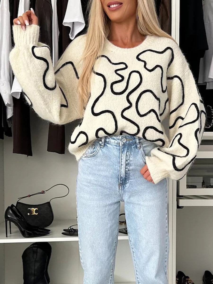 ivory pullover sweater with abstract and round neck