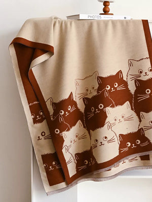 Charming reversible scarf in black brown with a playful cat pattern.