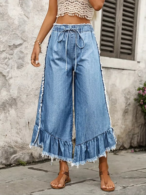 70% cotton, 28% polyester,2% elastane Care instructions: Machine wash cold wide-leg jeans in light wash denim blue with