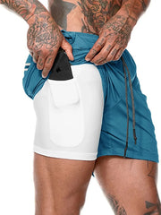 Dual-layer performance shorts in Sky Blue with built-in white compression shorts and phone pocket.