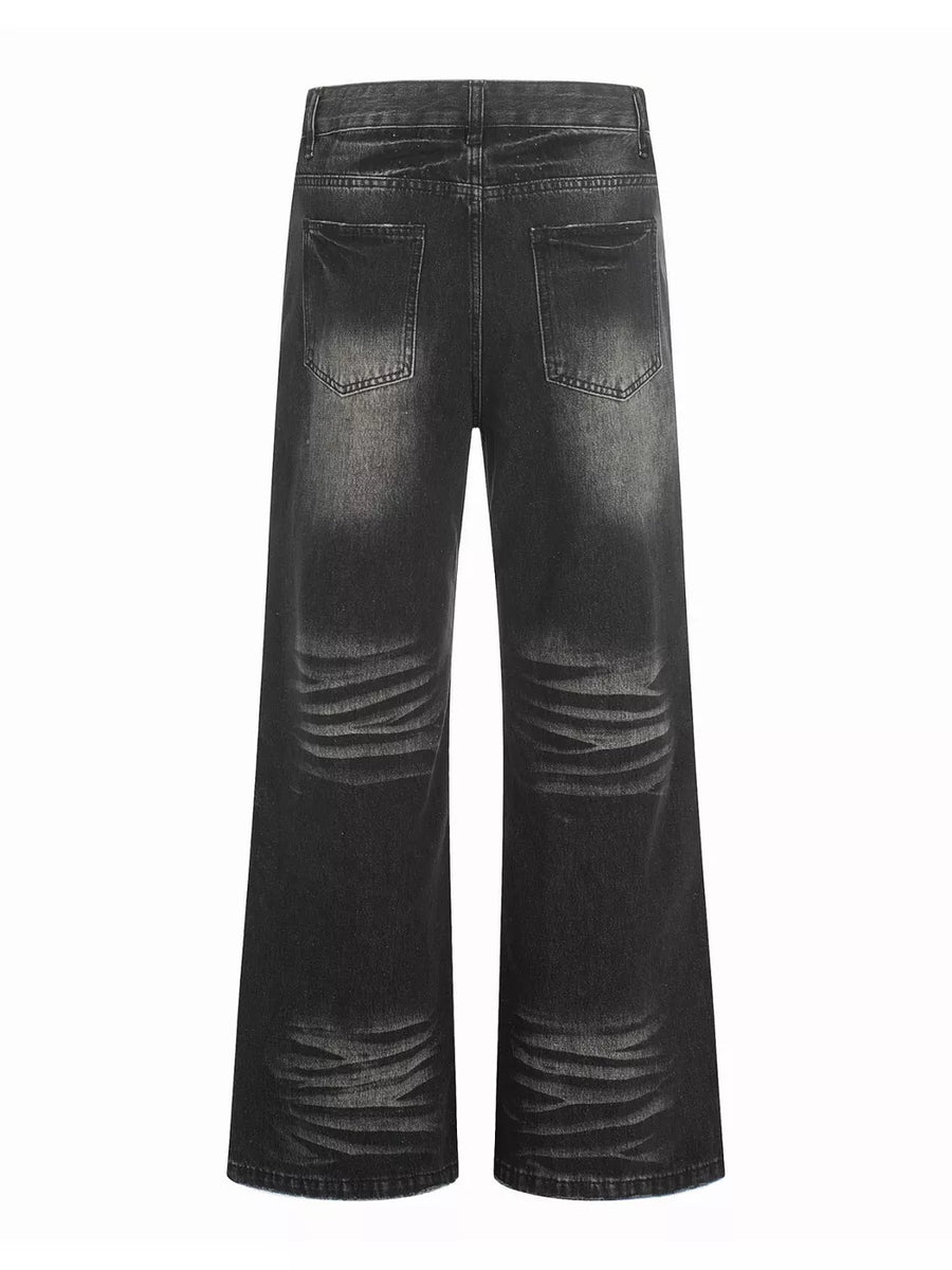 Men's black vintage wash wide leg jeans with distressed detailing