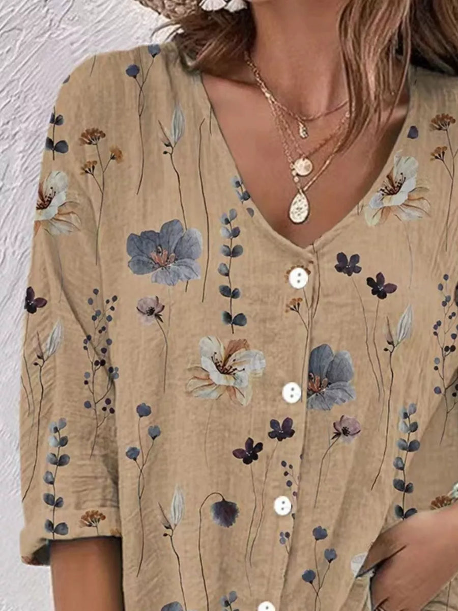 100% polyester Care instructions: Machine wash cold button-down shirt in cream with relaxed silhouette
