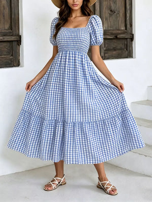 white midi dress featuring smocked and gingham