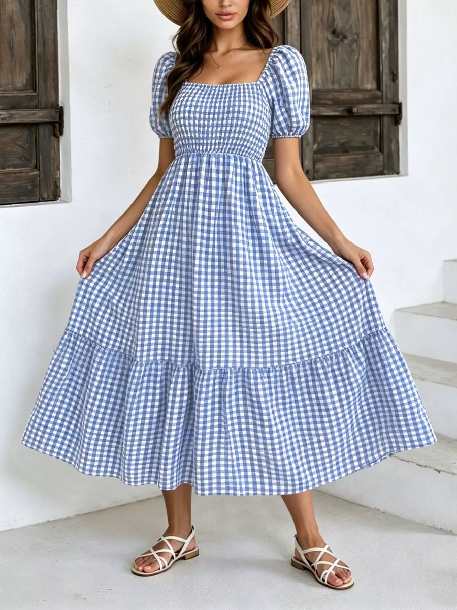 white midi dress featuring smocked and gingham