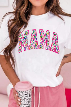 White graphic t-shirt with floral "MAMA" text, short sleeves, crew neck, polyester.