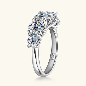 Silver band ring with five round moissanite stones and S925 stamp