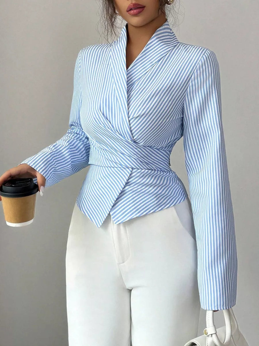 Blue striped long sleeve wrap blouse with a tie waist detail.