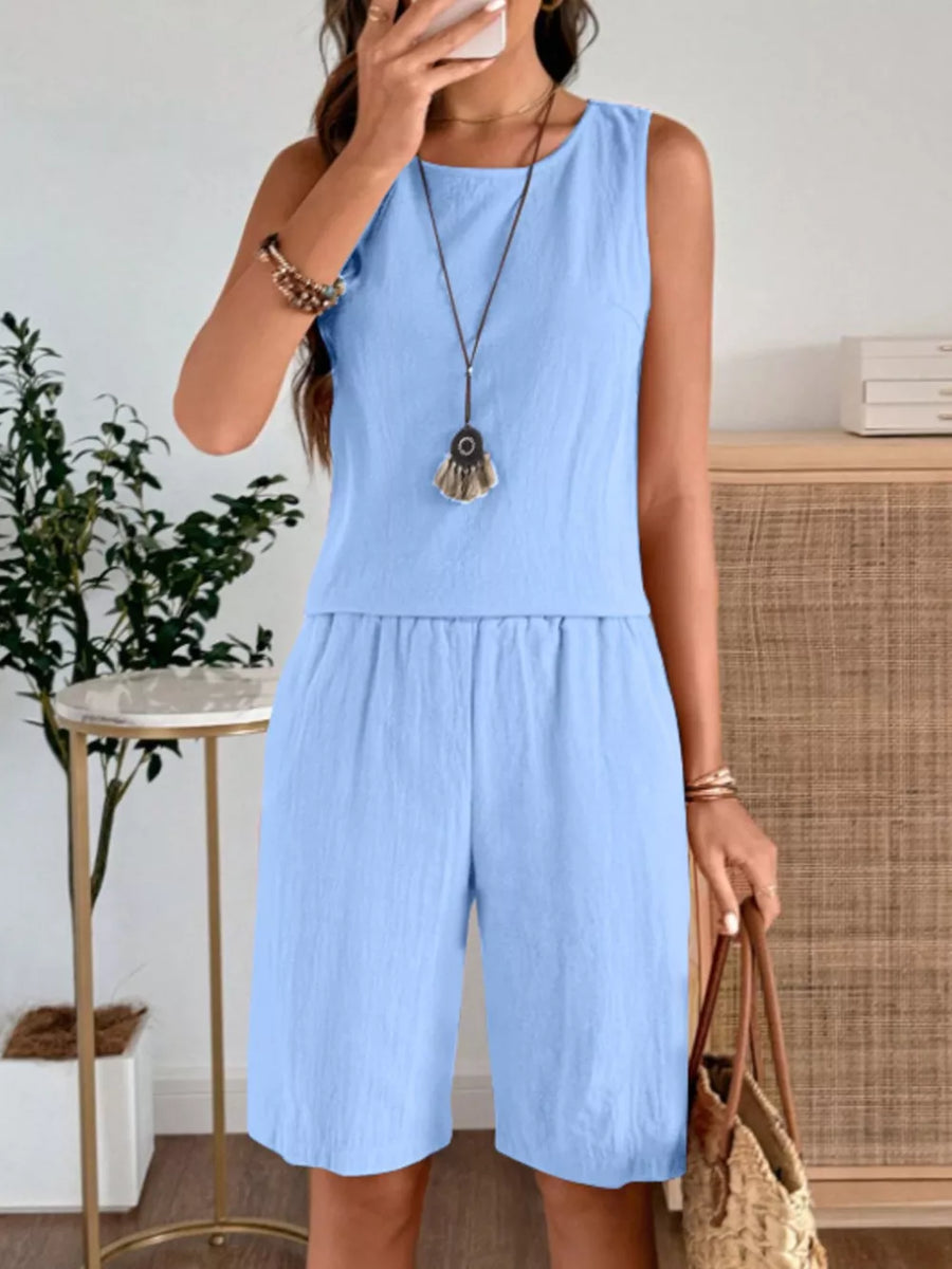 Sky blue relaxed fit tank and shorts set with round neckline and elastic waist shorts.