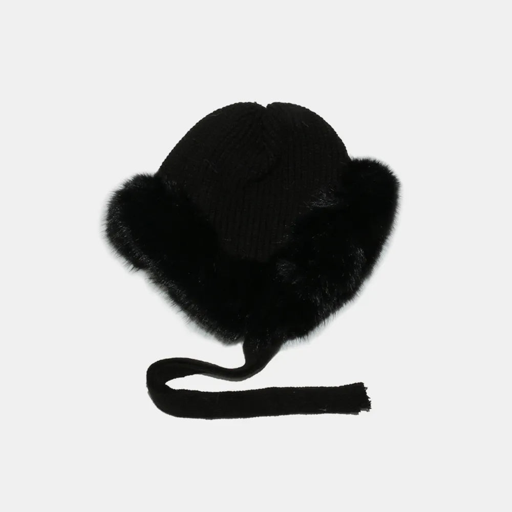 Black acrylic trapper hat with faux fur trim and tie straps.