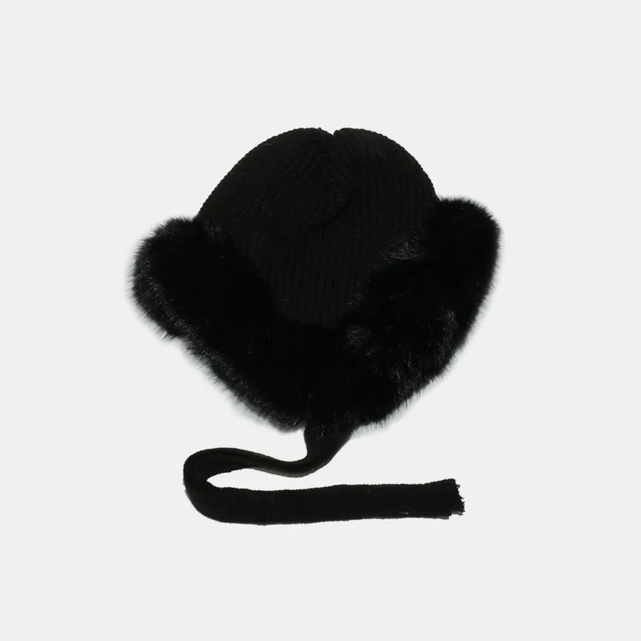 Black acrylic trapper hat with faux fur trim and tie straps.
